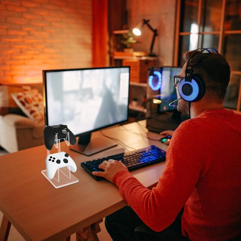Support de manette en acrylique transparent sur un bureau de jeu