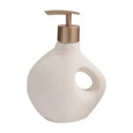 Distributeur de savon sculptural en céramique au design wabi-sabi