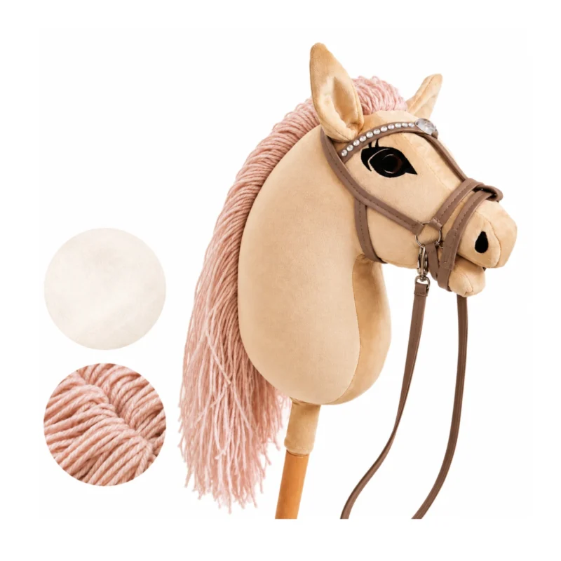 Cheval bâton palomino à crinière rose poudré et bride taupe avec frontal à strass