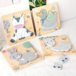 Puzzles en bois avec lapin, canard, mouton et vache